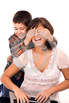 Mother and son playing hide and seek photo