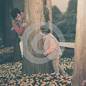 mother son playing hide seek games