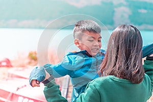 Mother and Son playing near Ashi Lake in Hakone, Japan