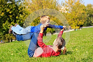 Mother and son playing outdoors