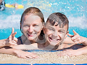 Mother and son in pool