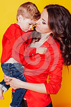Mother and son in red shirts family photo