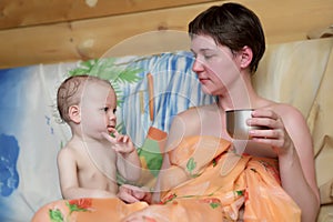 Mother with son after sauna visit