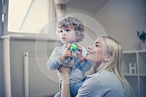 Mother and son spending time together. Close up.