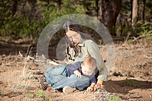 Mother and son studying things in nature