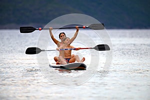 Mother and son on SUP board