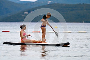 Mother and son on SUP board