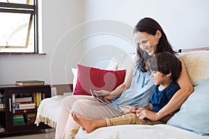 Mother and son using tablet