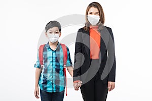 Mother and son wearing surgical mask
