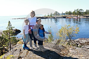 Mother with sons on island in Ladoga skerries