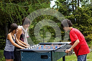 Mother and sons playing