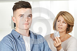 Mother Talking To Teenage Son About Contraception