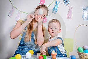 Mother teaches kid to do craft items