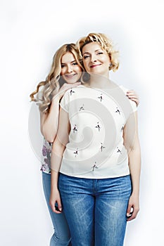 Mother with teen daughter together posing happy smiling isolated on white background with copyspace, lifestyle people