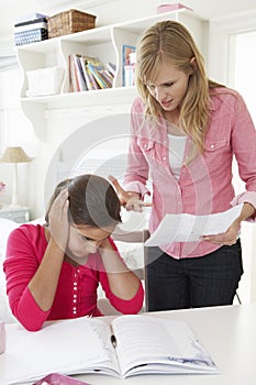 Mother Telling Daughter Off For Bad School Report