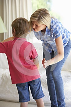 Mother Telling Off Son At Home