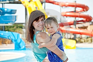 Mother with toddler at aquapark