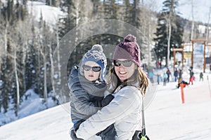 Mother & Toddler Son on the Top of a Ski Mountain in Colorado