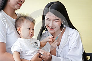 The mother took a small son to see the doctor regularly on an appointment. To check the health