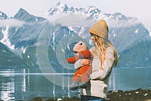 Mother traveling with child in Norway mountains