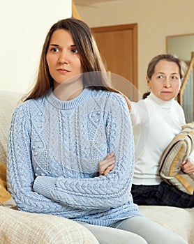Mother tries asking propitiation with his teen daughter photo