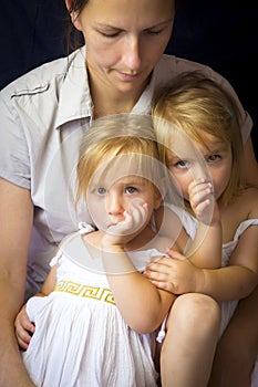 Mother and twin girls