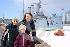 A mother with two children against the cruiser