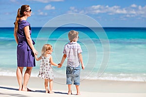 Mother and two kids at beach