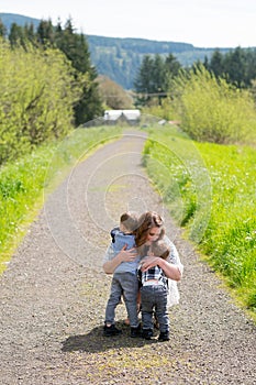 Mother and Two Sons Lifestyle Portrait