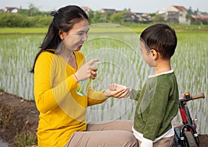 A mother uses antiseptics for her son