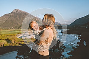 Mother walking with daughter family vacations together travel outdoor parent and child girl happy emotions