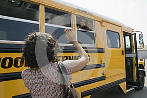 Mother Waving To Daughter photo