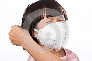 Mother wearing N95 mask protection for her daughter