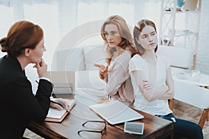 Mother and Young Daughter in Psychologist Office.