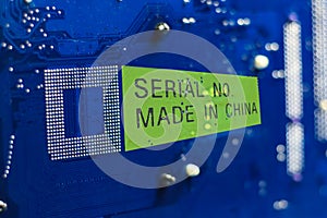 . motherboard. color blue. there are scratches on it. Caption Made in China