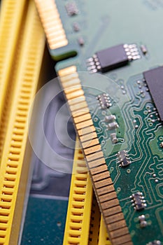 The motherboard and computer components. Computer accessories on a workshop table