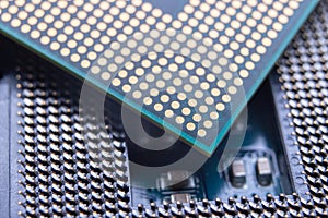 The motherboard and computer components. Computer accessories on a workshop table