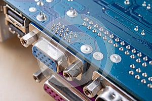 The motherboard and computer components. Computer accessories on a workshop table