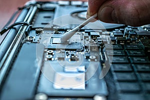 Motherboard service. Technology hardware repair and electronic computer maintenance from technician engineer man