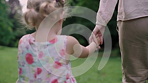 Motherhood. Child Holding Mother Hand Closeup