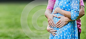 motherhood and pregnancy. hands on pregnant woman belly. Baby expectation