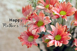 Mothers Day card and greeting concept with a bouquet of dahlia peach color flowers background. Happy Mothers Day.