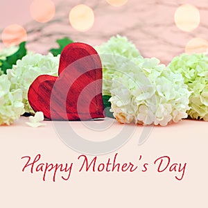 Mothers Day card with heart and flowers