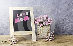 Mothers day concept of paper pink rose flowers with love mom