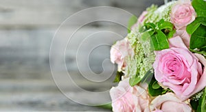 Mothers Day flowers on wooden background