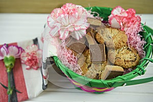 Mothers day gift basket with flowers and homemade cookies