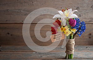 Mothers day gift flowers on wood