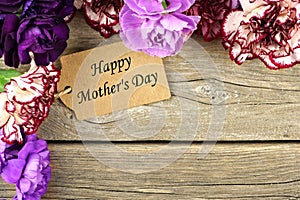 Mothers Day gift tag with flower corner border on wood