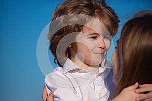 Mothers love. Closeup portrait of mother and child kissing. Mother hugging and embracing son. Mothers day, love family