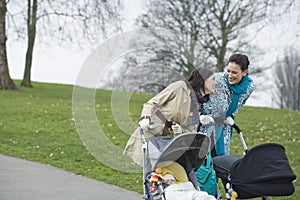 Mothers With Strollers In Park